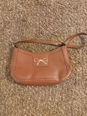 Tan Leather Shoulder Bag with Gold Bow Accent